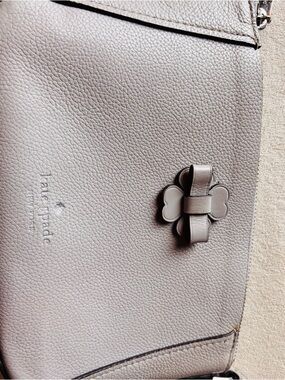 kate spade pebble leather crossbody in light taupe gray